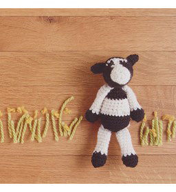 Minidier zwartbonte koe gemaakt van Drops Karisma