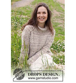 Damestrui met raglanmouwen in fraai kantpatroon. gemaakt van Rondbreinaald nr 4,5