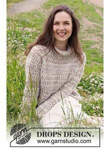 Damestrui met raglanmouwen in fraai kantpatroon.