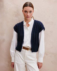 Mouwloos damesvest in kantpatroon