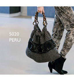 Tas gemaakt van lint, band, franje, strikjes, bloemen