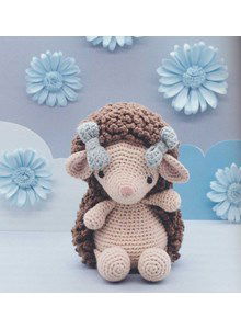 Knuffel egeltje met strikjes in het haar