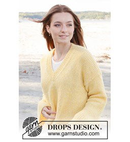 Wijde damestrui met splitten in zijnaad gemaakt van Drops Air