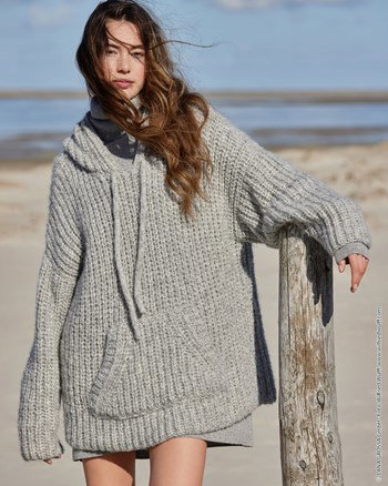 XL damestrui met zakken om handen in warm te houden