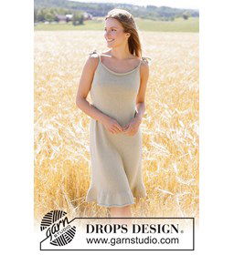 Gebreide katoenen jurk met ruches en strikbanden gemaakt van Breinaalden zonder knop