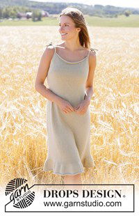 Gebreide katoenen jurk met ruches en strikbanden