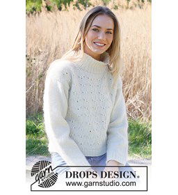 Damestrui met reliëfpatroon en hoge kraag gemaakt van Drops Merino extra fine