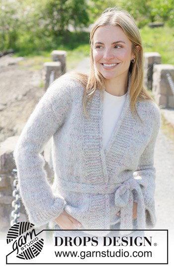 damesvest met trompetmouwen en ceintuursluiting