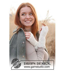 Gebreide polswarmers gemaakt van Drops Merino extra fine