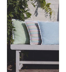 Kussen gemaakt van knopen