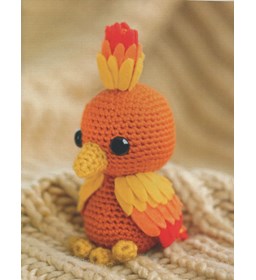 feniks met vilten veren gemaakt van Scheepjes Colour Crafter