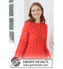 Gebreide top-down trui met rijke kabelpatronen gemaakt van Breinaalden zonder knop