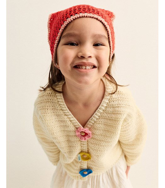 Haakpatroon meisjesvest met versierde knoopsluiting