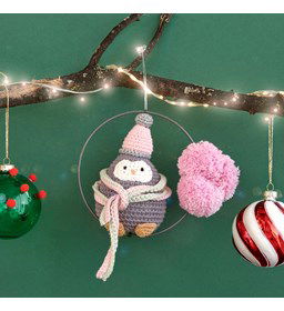Amigurumi pinguïn gemaakt van Ringen en frames