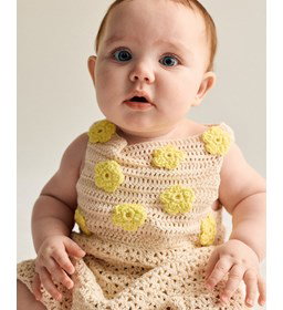 A-lijn babyjurkje gemaakt van knopen