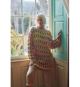 Damestrui in verrassend open breiwerk. 