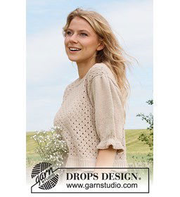 Damestrui met pofmouwtjes gemaakt van Drops Safran