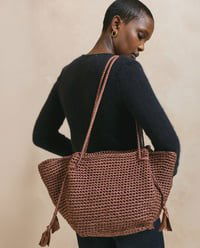 Tas met gevlochten schouderbanden gemaakt van Handwerk accesoires