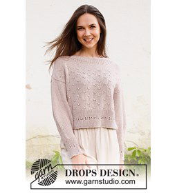 Damestrui met brede boorden met gaatjespatroon gemaakt van Drops Belle