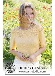 Damestruitje met korte mouwen en ronde pas in kabelpatroon.