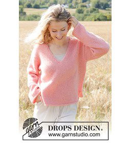 Weerklank van Koraal Trui gemaakt van Drops Air