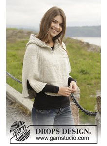 Gebreide poncho met capuchon en split