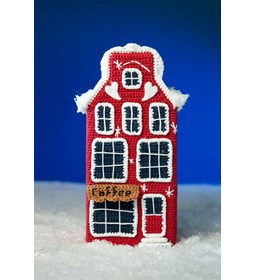 Grachtepand met koffieshop gemaakt van Boeken poppen en dieren