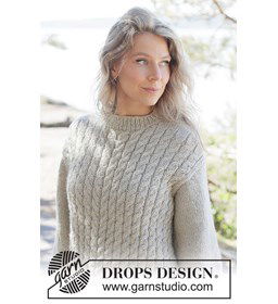 Gebreide kabeltrui met diagonale schouders gemaakt van Handwerk accesoires