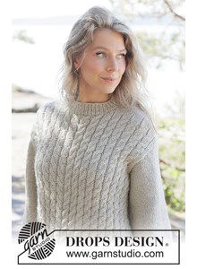 Gebreide kabeltrui met diagonale schouders