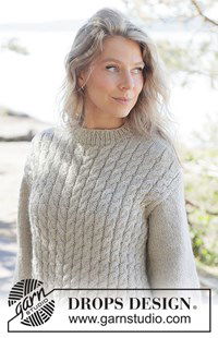 Gebreide kabeltrui met diagonale schouders