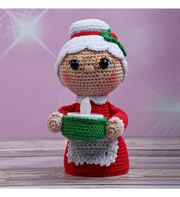 Kerstvrouw met lachtje gemaakt van Decoratie en miniaturen