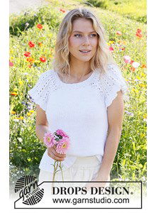 Damestop met korte raglanmouwtjes met gaatjespatroon.