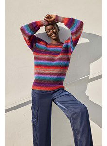 Vrolijke damestrui in warme kleuren.