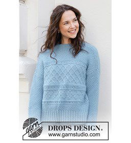 Wijde damestrui met diagonale schouderlijn gemaakt van Drops Kid Silk