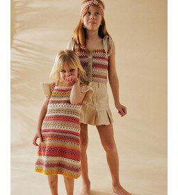 Lange meisjes jurk gemaakt van Phildar Phil Rustique