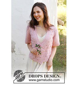 Dames wikkelvest met lage V-hals en korte mouwen. gemaakt van Drops Cotton Merino