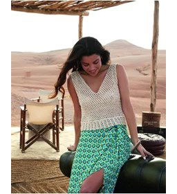 Mouwloos truitje in open gehaakt patroon