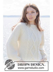 Breipatroon damestrui met raglan en kabels gemaakt van Drops Andes