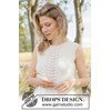 Luchtige gebreide top met elegant golfpatroon gemaakt van Drops Belle