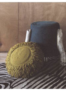 Dik rond kussen met franjes