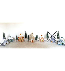 Kerstdorp gemaakt van Scharen en mesjes