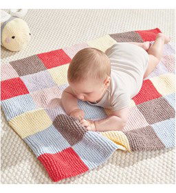 Geblokte deken in ribbelsteek gemaakt van Rico Creative Chenillove