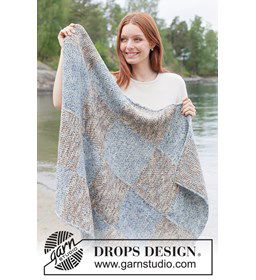 Grote deken in dubbele gerstekorrel en vierkanten van DROPS Fiesta gemaakt van DROPS Fiesta