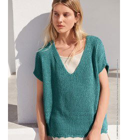 Wijde damesspencer gemaakt van Lana Grossa Linarte