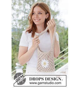 Gehaakte tas met madeliefjes en granny squares gemaakt van Drops Paris