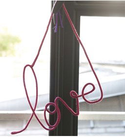 Tekst gemaakt van Looms en punnikklosjes