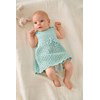 mouwloos baby jurkje met waaierpatroon gemaakt van Lana Grossa Cool Wool Baby
