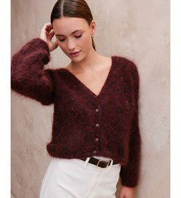 Harig damesvest met knoopsluiting  gemaakt van Breinaalden