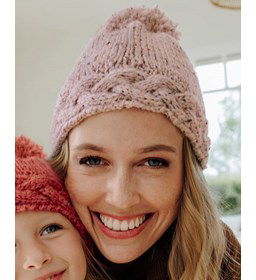 Damesmuts met pompon gemaakt van Phildar Phil Tweedy