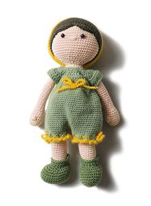 Pop met muts en overall